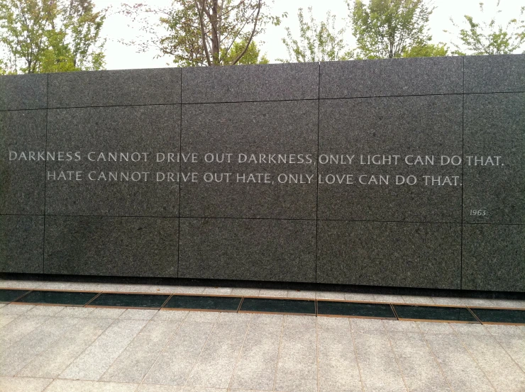 some words carved into the side of a wall