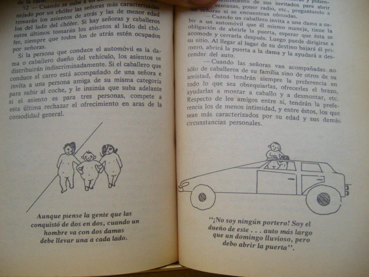 a person holding up an open book that contains instructions on how to handle a paramed
