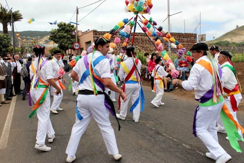 many people are dressed in colorful clothes