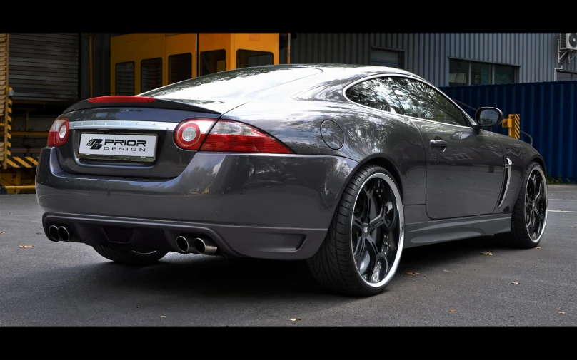 the back end of the grey sports car