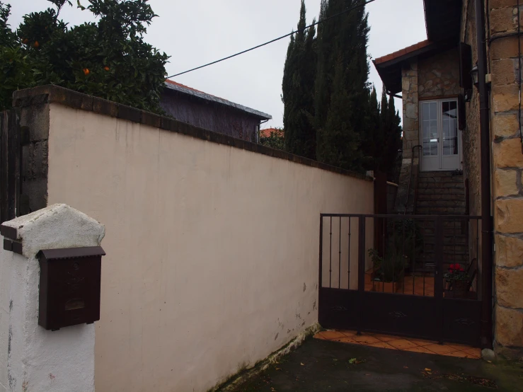 a po of a small gate and a building