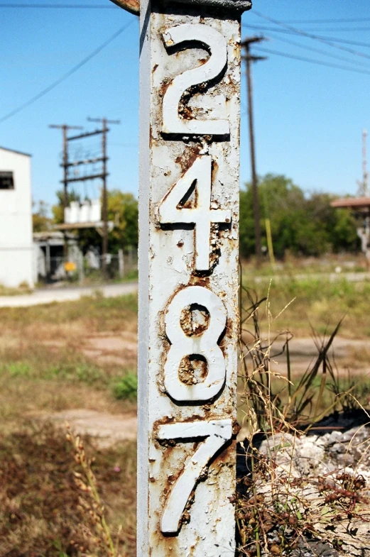 an old rusted sign with the words s - 340 on it