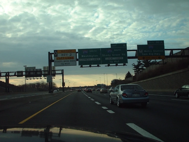 a road that has a couple of signs on it