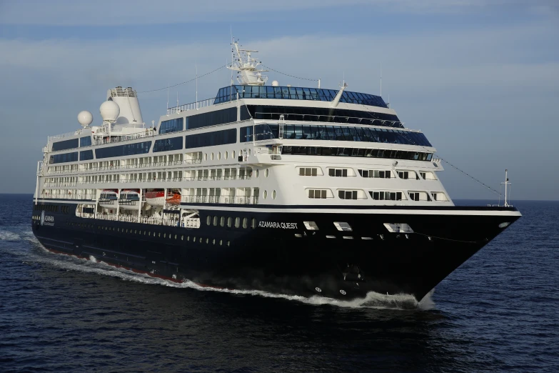 a cruise ship with its huge top pulled back