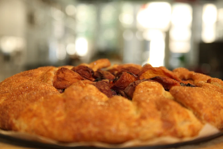 an uncooked breaded pastry is on the table