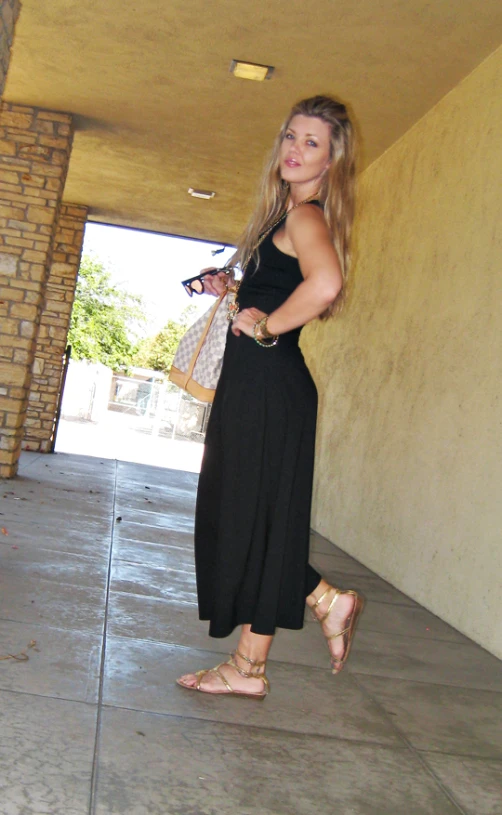 a girl standing in front of an open garage door