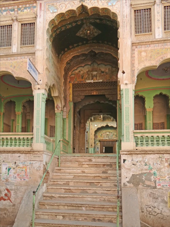 a very large building with stairs and a staircase