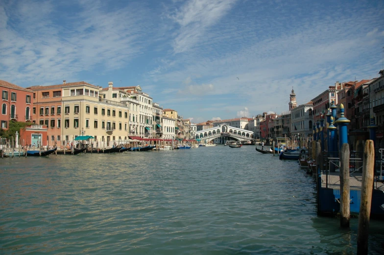 a view of buildings along the river in a city