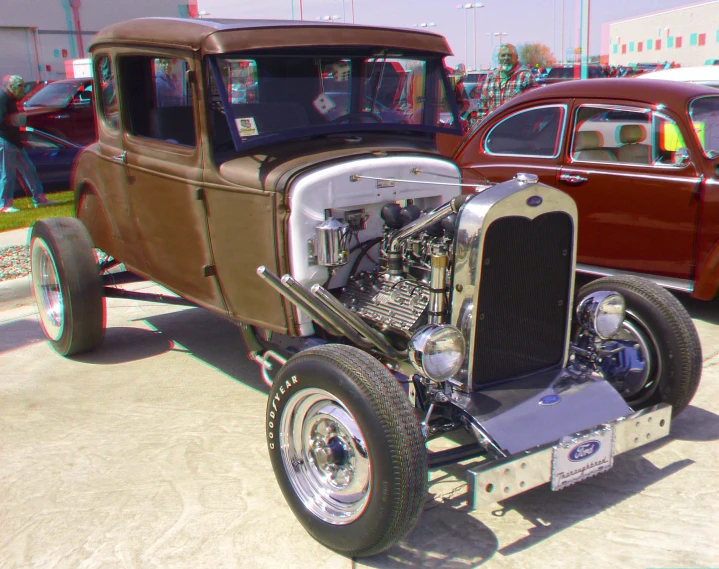 old antique cars are parked at a car show