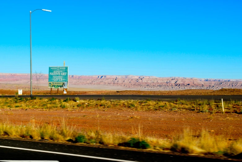 the highway sign on the side of the highway