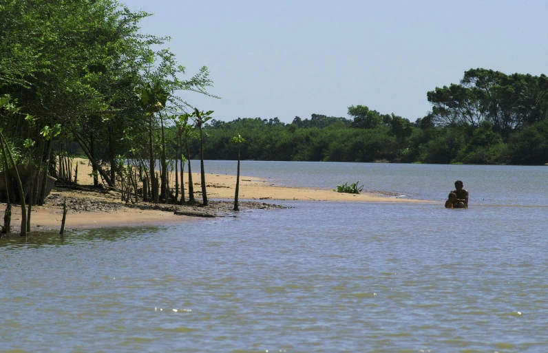 the motorboat is heading up the shore towards the water