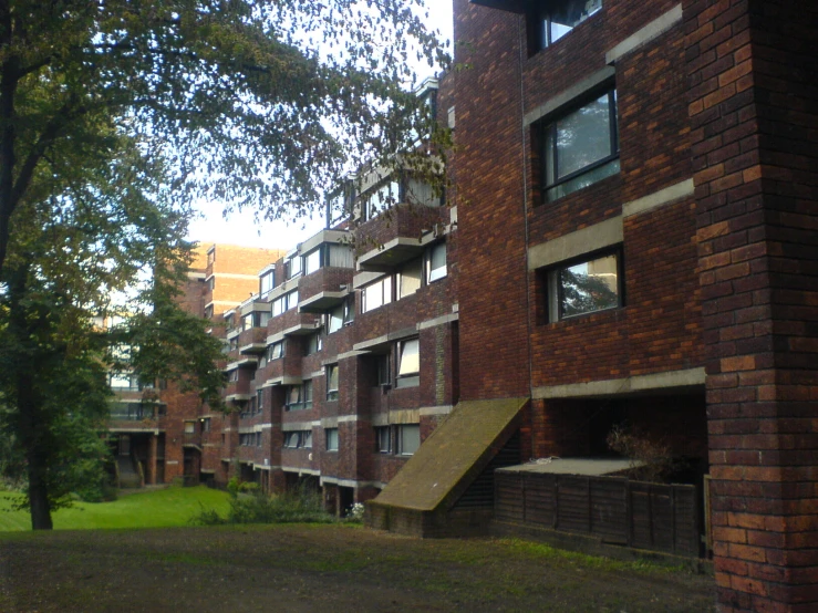 the side of a building is almost empty with a few steps going up to it