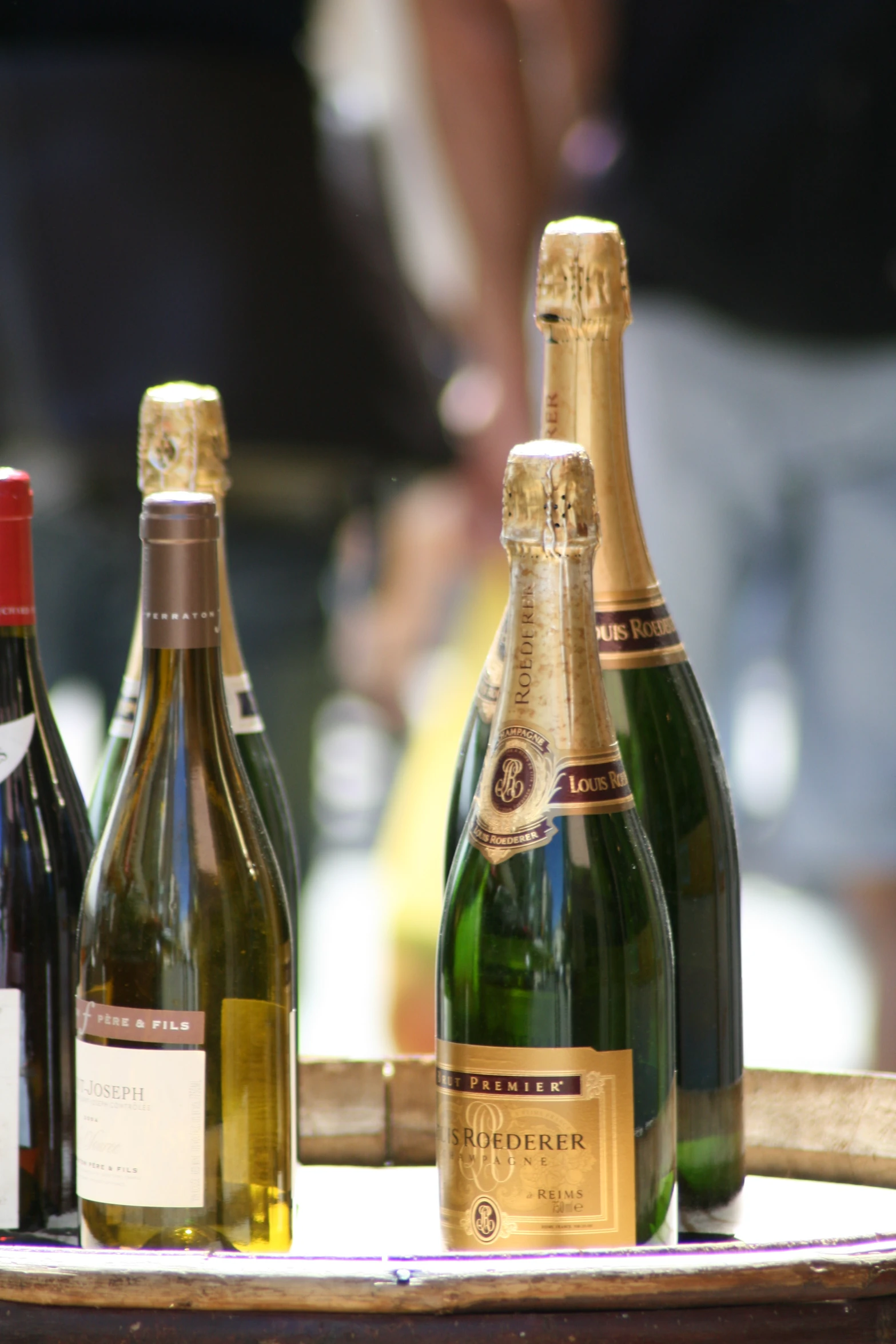 several bottles of wine sitting on a table