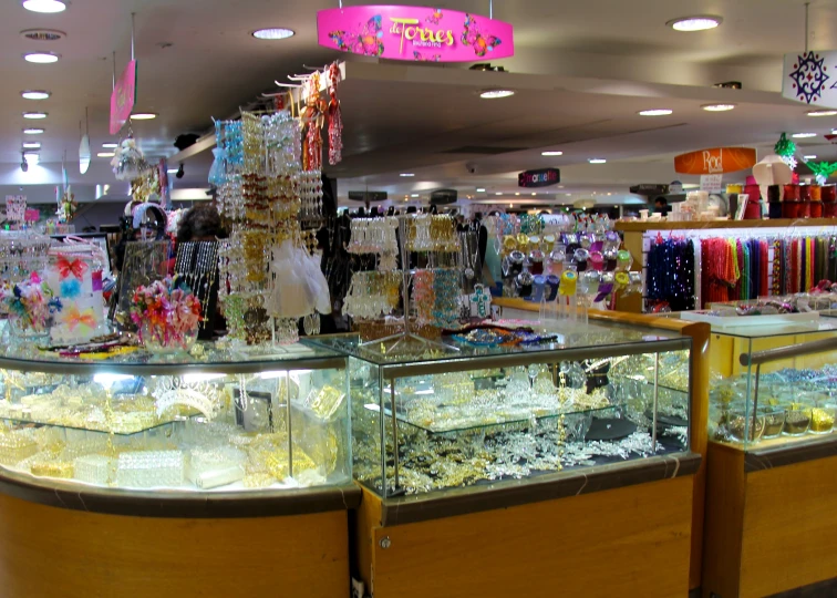 a store has several items on display and many of the lights above them