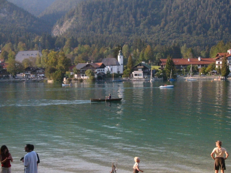 a large body of water with some people on it