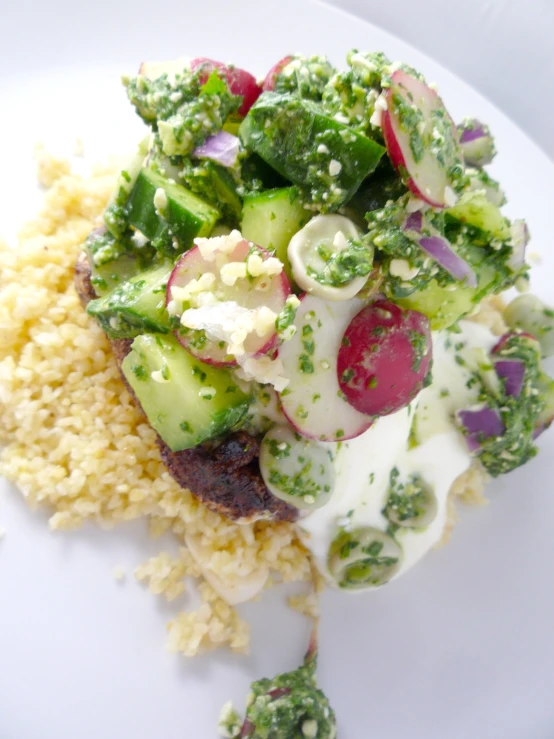 a plate of food with rice and vegetables