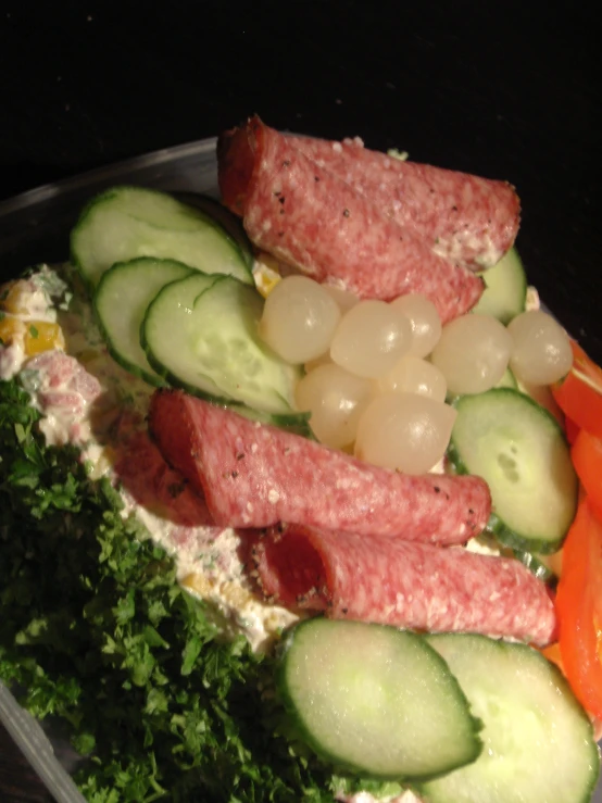 a tray of different kinds of cut up food