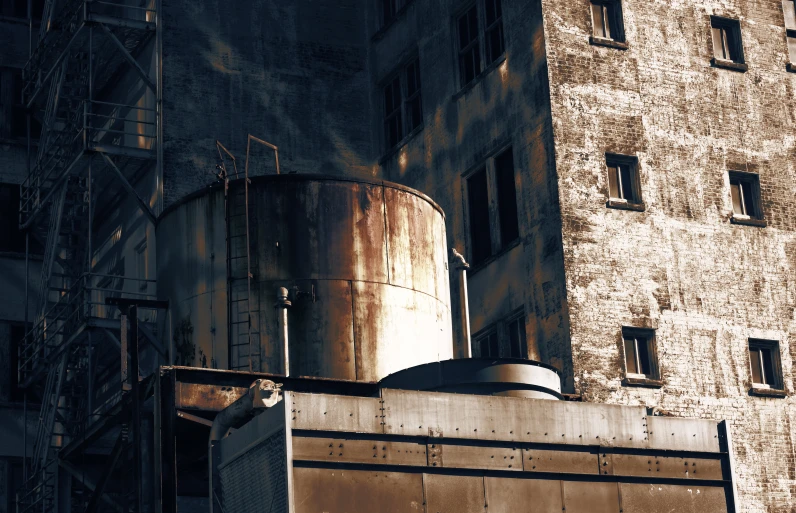 an old factory building that is missing its roof