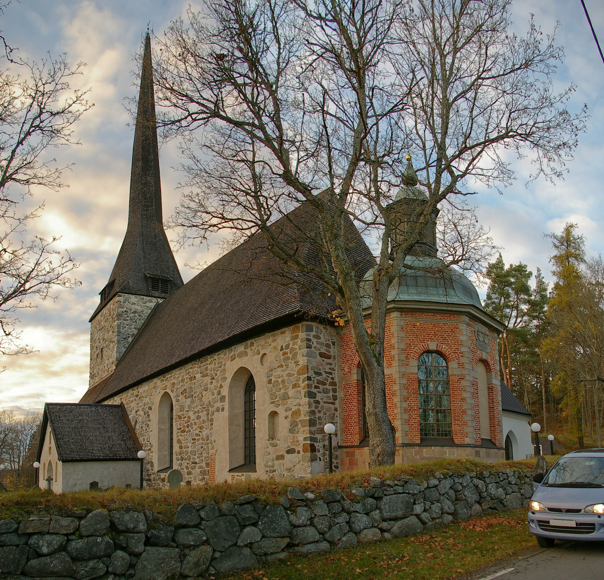 a small church on the side of a road