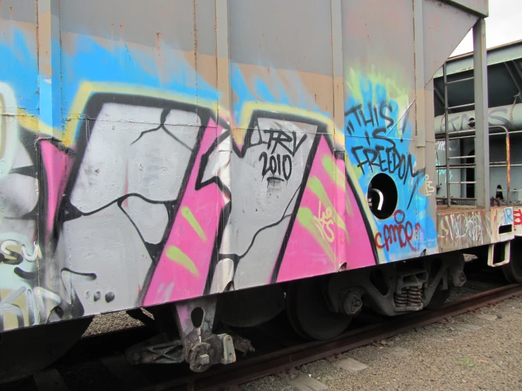 a train car with graffiti on it's side