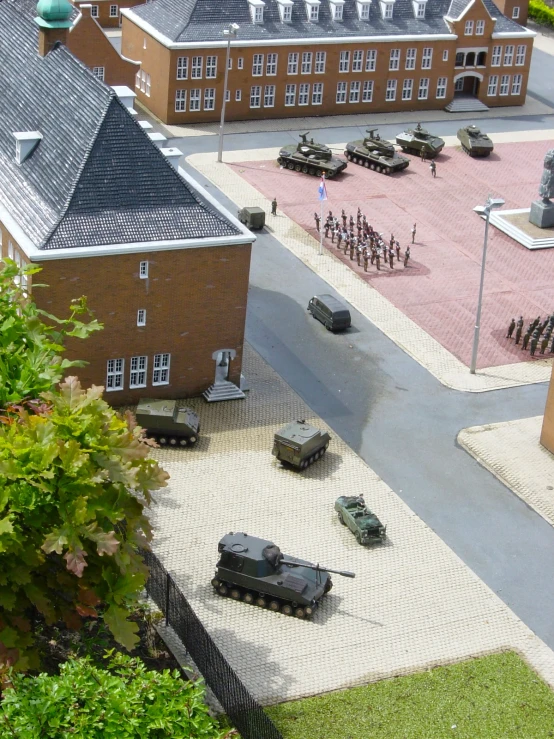 a model town with a bunch of army vehicles