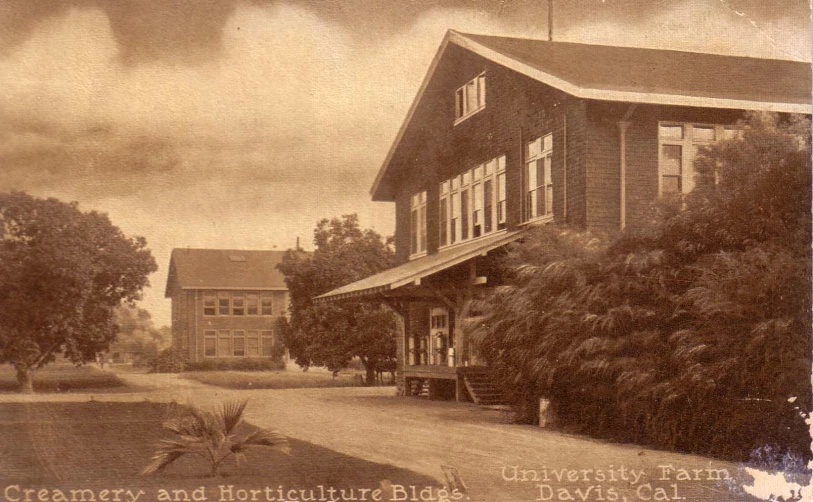 vintage pograph of a building on a country road