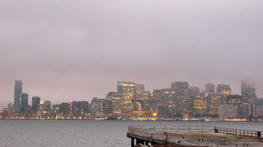 a very big city with a few buildings that are by the water