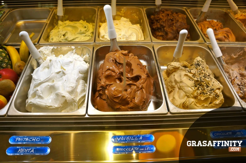 a row of trays filled with different types of ice cream
