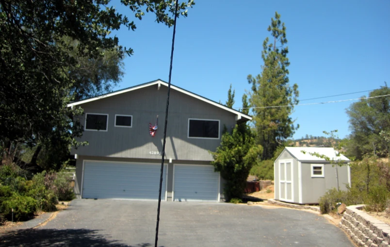 a home with a attached garage and two attached cars