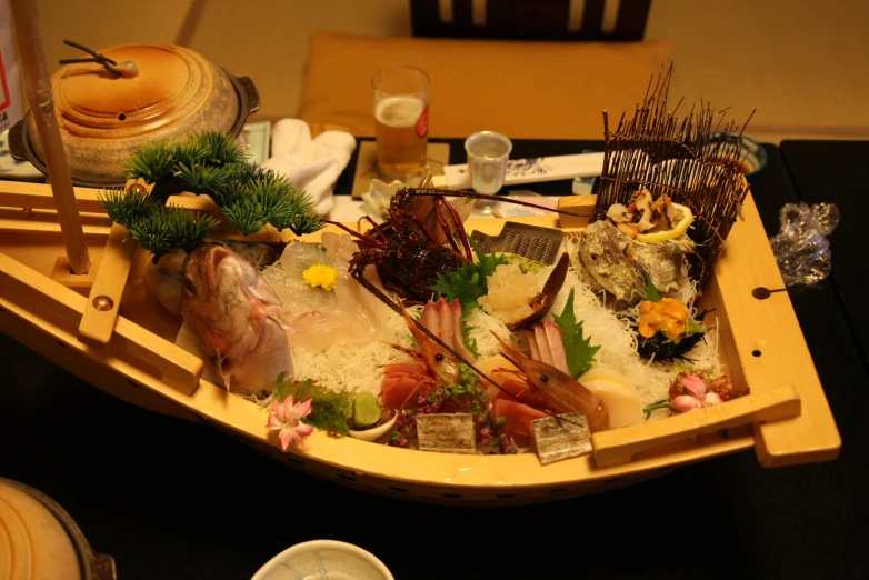 an arrangement of food on a wooden tray