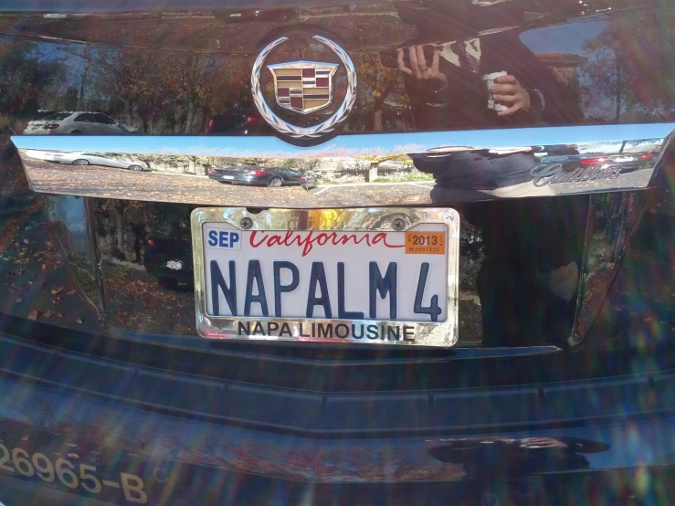 a badge plate in the rear of a car