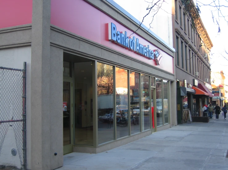 a store front on a sidewalk in a city