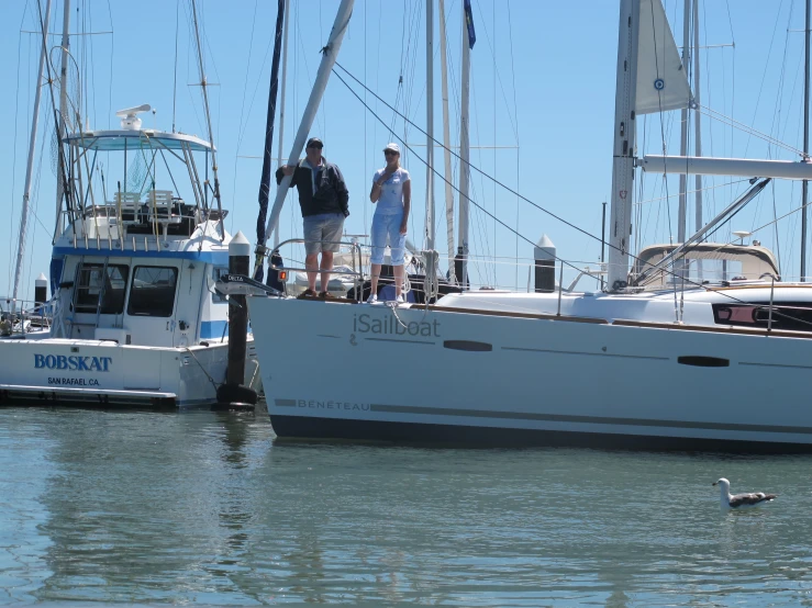 there are some people standing on the boat