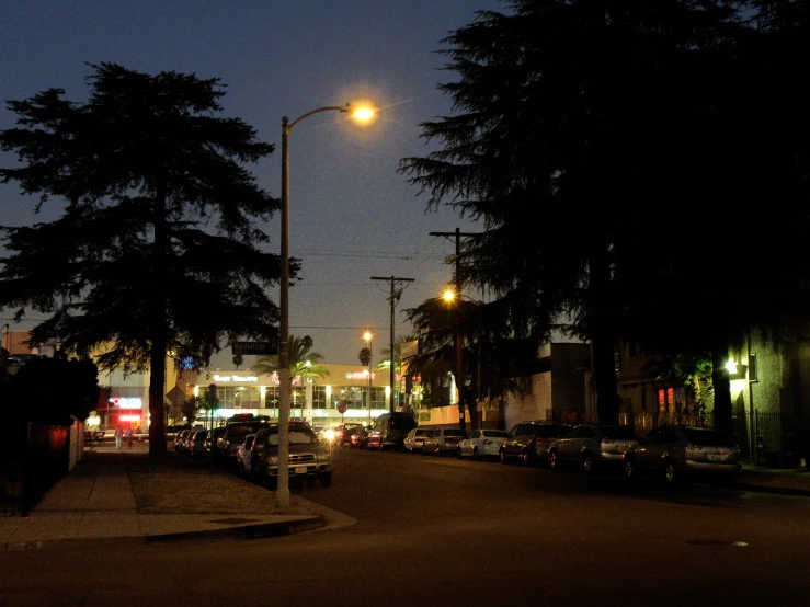 a street light with multiple lights on at night