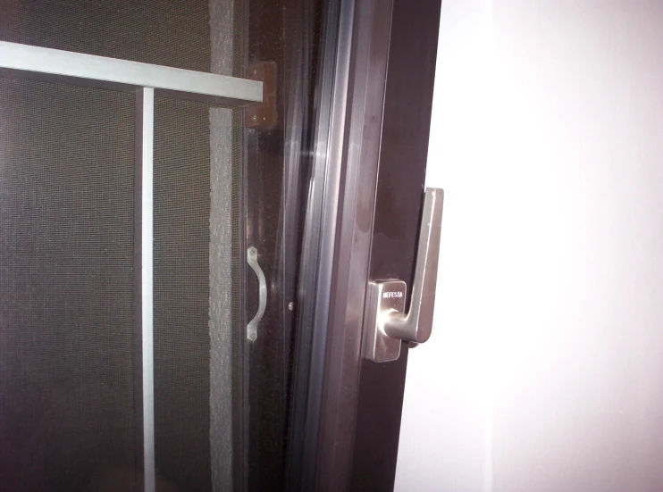 the sliding door handle has a glass covering