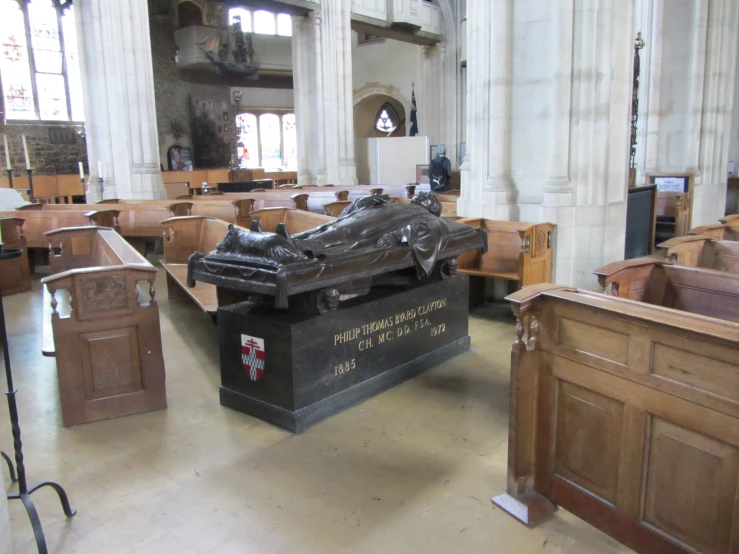 a statue is placed on the floor of a room