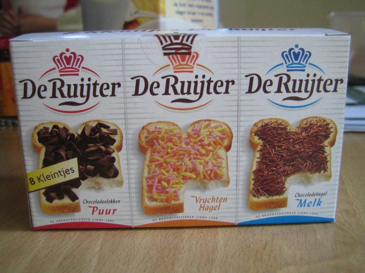 four boxes of deluyer food on a table