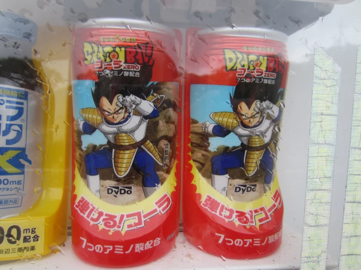 two cans of dragon ball in the refrigerator
