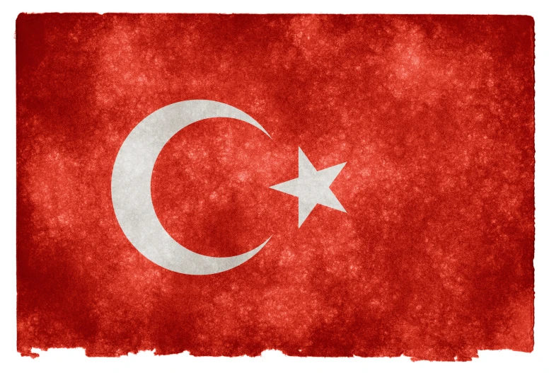the flag of turkey painted in red with a white star