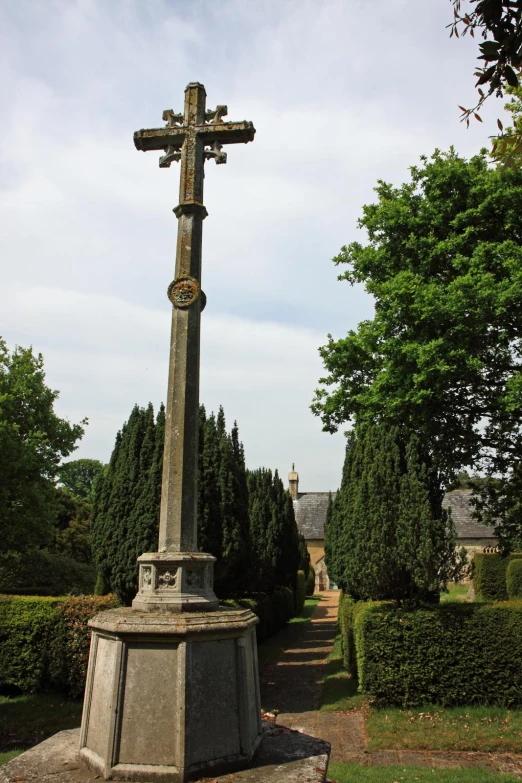 the large cross is sitting in the park