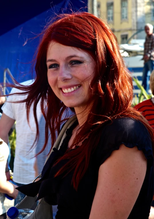 an image of a woman smiling in the rain