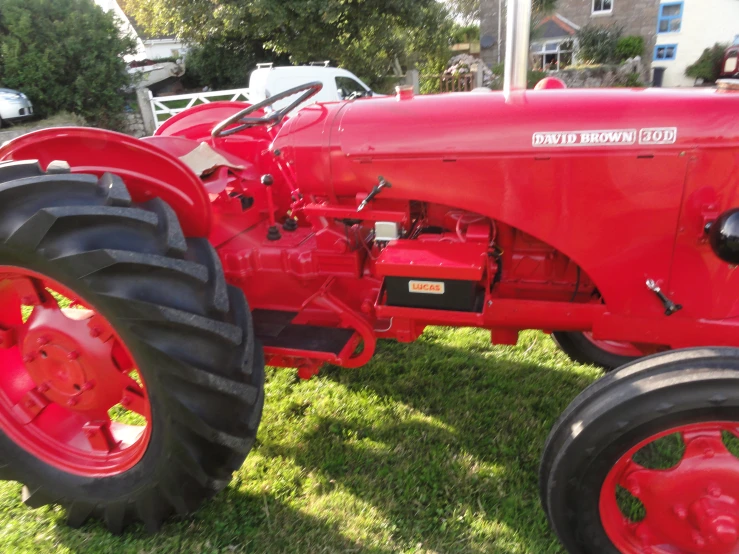 a close up s of a big red tractor