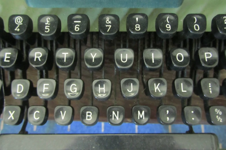 closeup po of typewriter, with keys