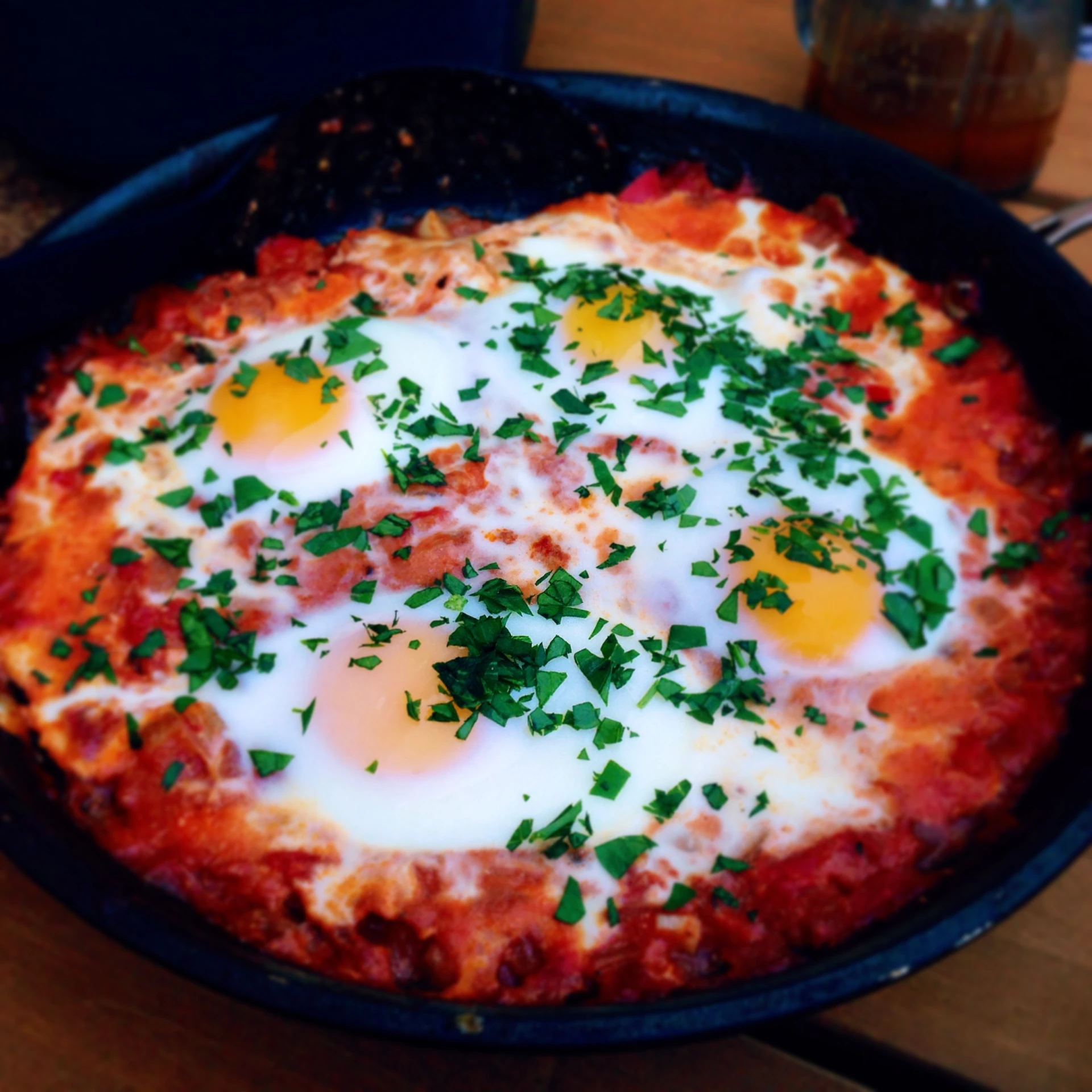 an egg on top of some sort of cooked pizza