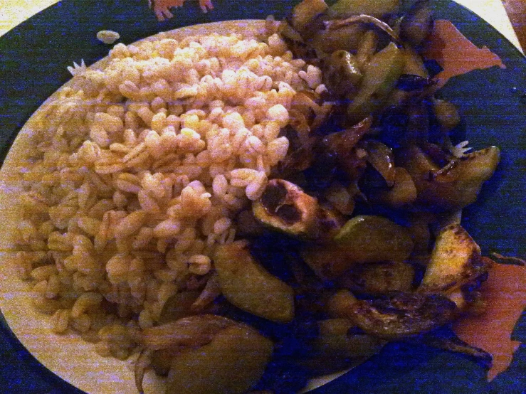 plated meal of vegetables with rice, potatoes and sauce