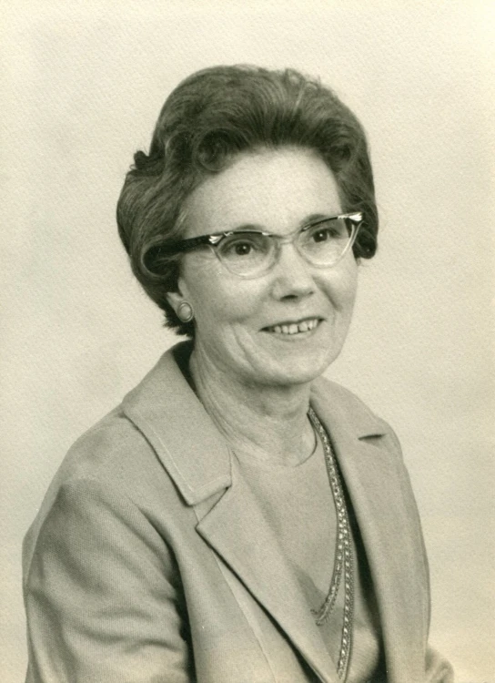 an old po of a woman wearing glasses