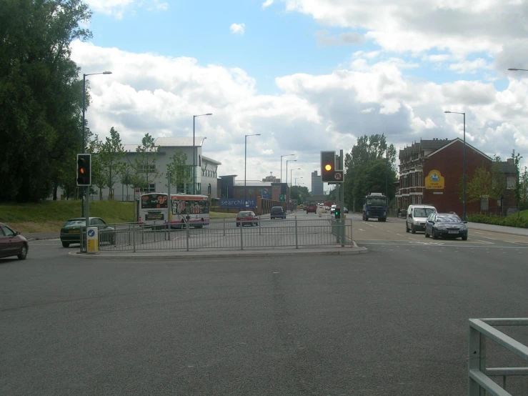 an intersection at a street light that is empty