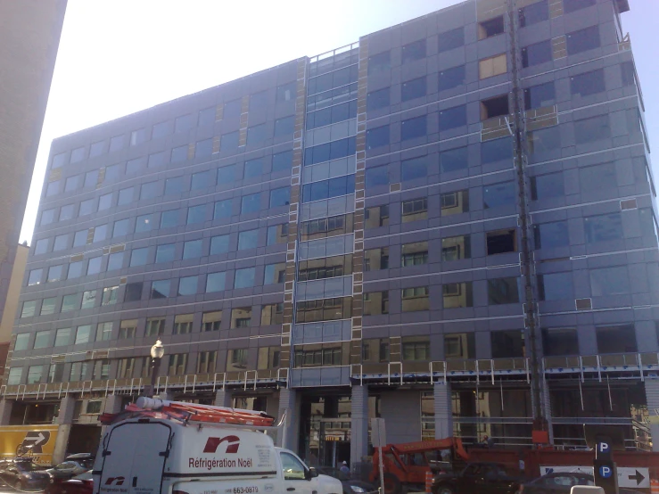 a large building sitting next to a city street