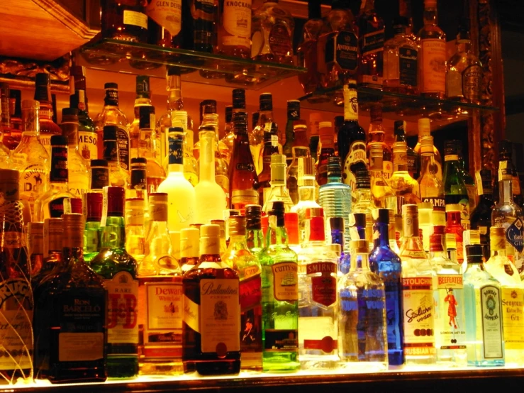 several different types of bottles in a liquor store