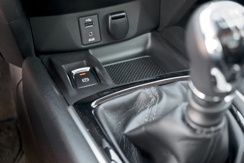 a gear switch of an automatic vehicle with other things